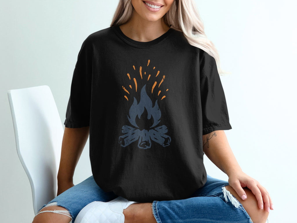 Black t-shirt with a stylized campfire graphic in blue and orange.