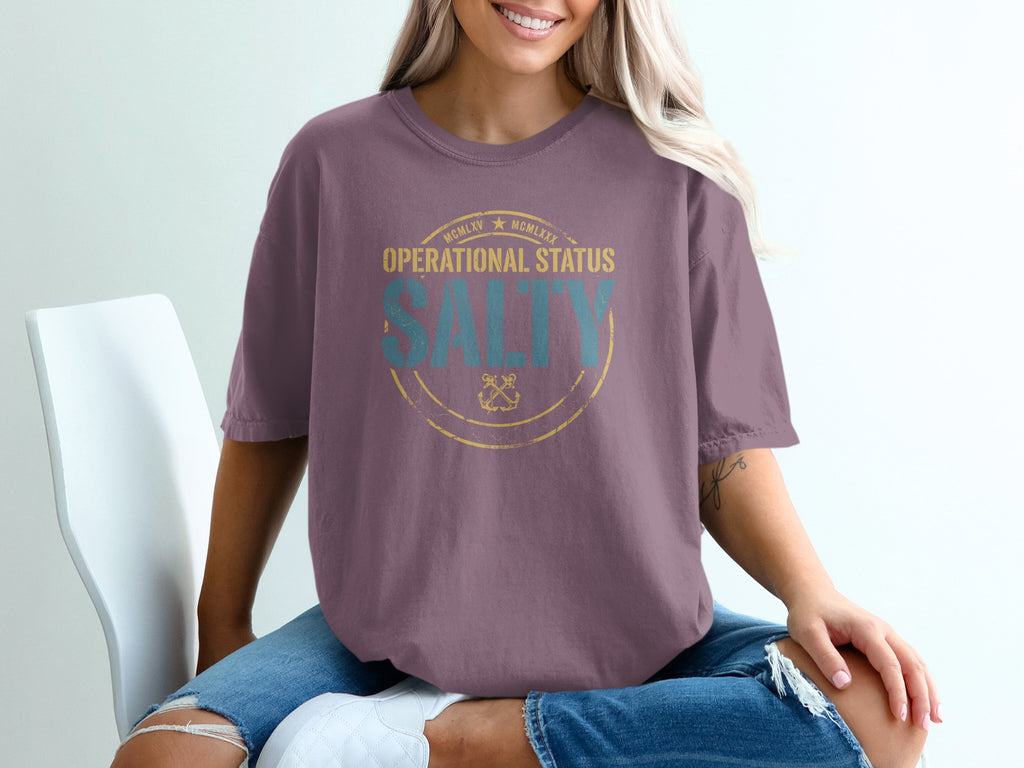 Purple t-shirt with "Operational Status Salty" text and anchor logo.