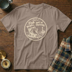 Muted brown crewneck t-shirt featuring a circular graphic of a fish lounging in a beach chair.