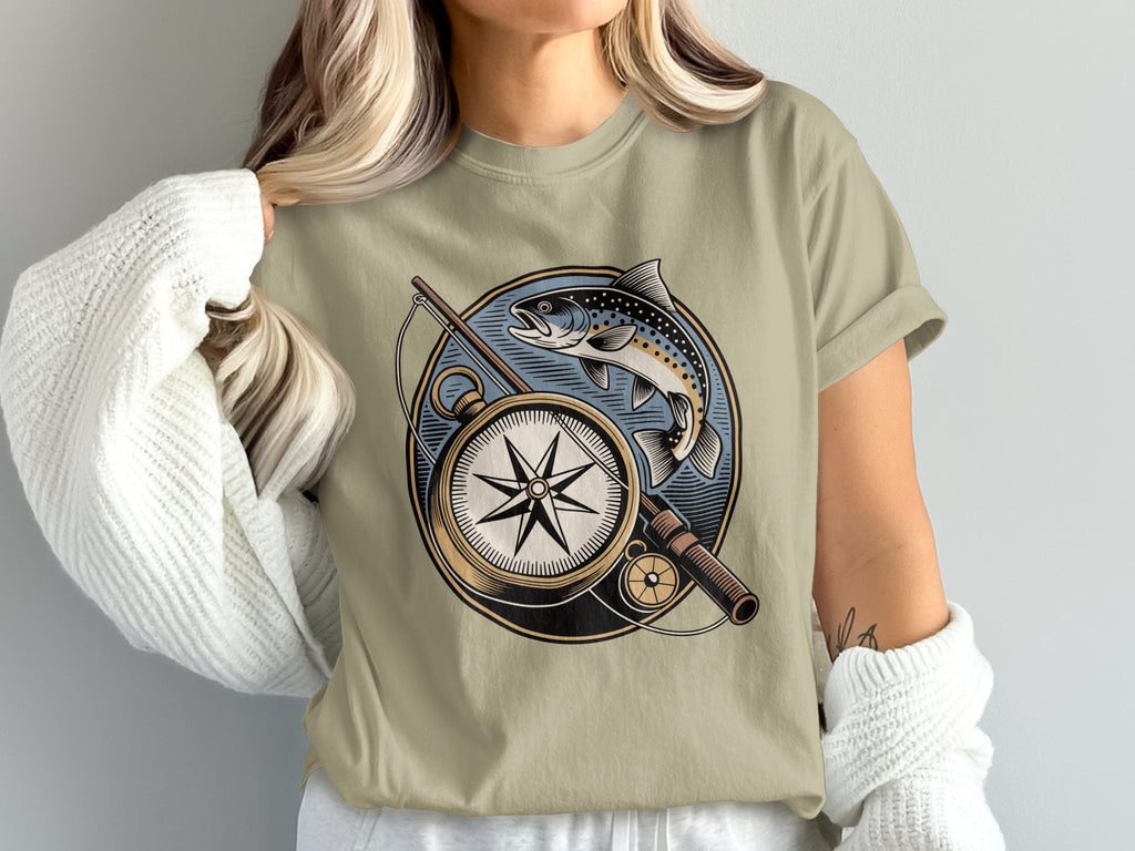 T-shirt with circular design of compass, fishing rod, and leaping fish.