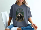 T-shirt graphic of a bear with crossed arms and text "DEN LIFE DO NOT DISTURB".