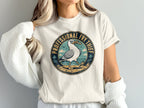 Circular graphic with seagull holding french fry and text "PROFESSIONAL FRY THIEF".