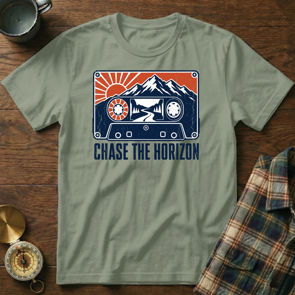 Sage t-shirt with vintage cassette tape graphic and "Chase the Horizon" text.
