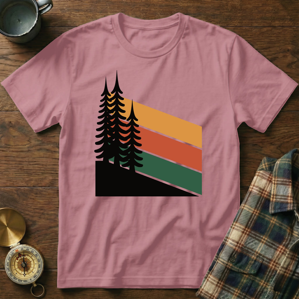 Pink t-shirt with a retro forest graphic and stripes.