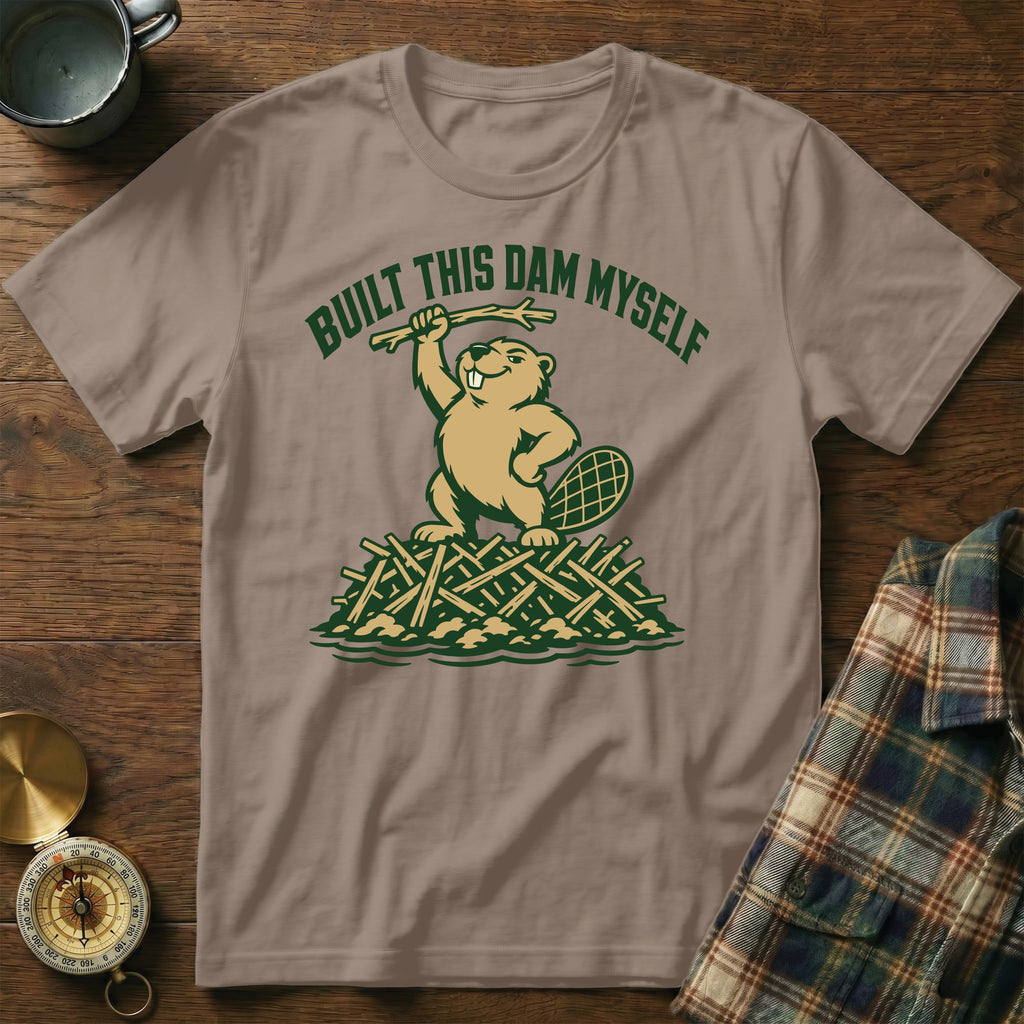 T-shirt featuring a beaver on a dam, text "BUILT THIS DAM MYSELF".