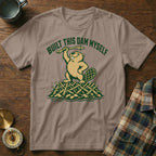 T-shirt featuring a beaver on a dam, text "BUILT THIS DAM MYSELF".