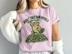 Pink t-shirt with a beaver standing on a dam, holding a stick, text reads "BUILT THIS DAM MYSELF".