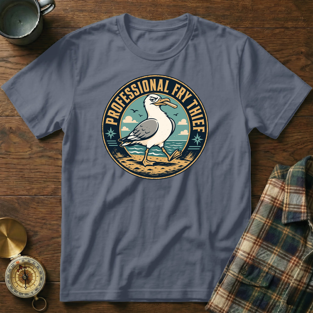 Seagull graphic with "Professional Fry Thief" text on a blue t-shirt.