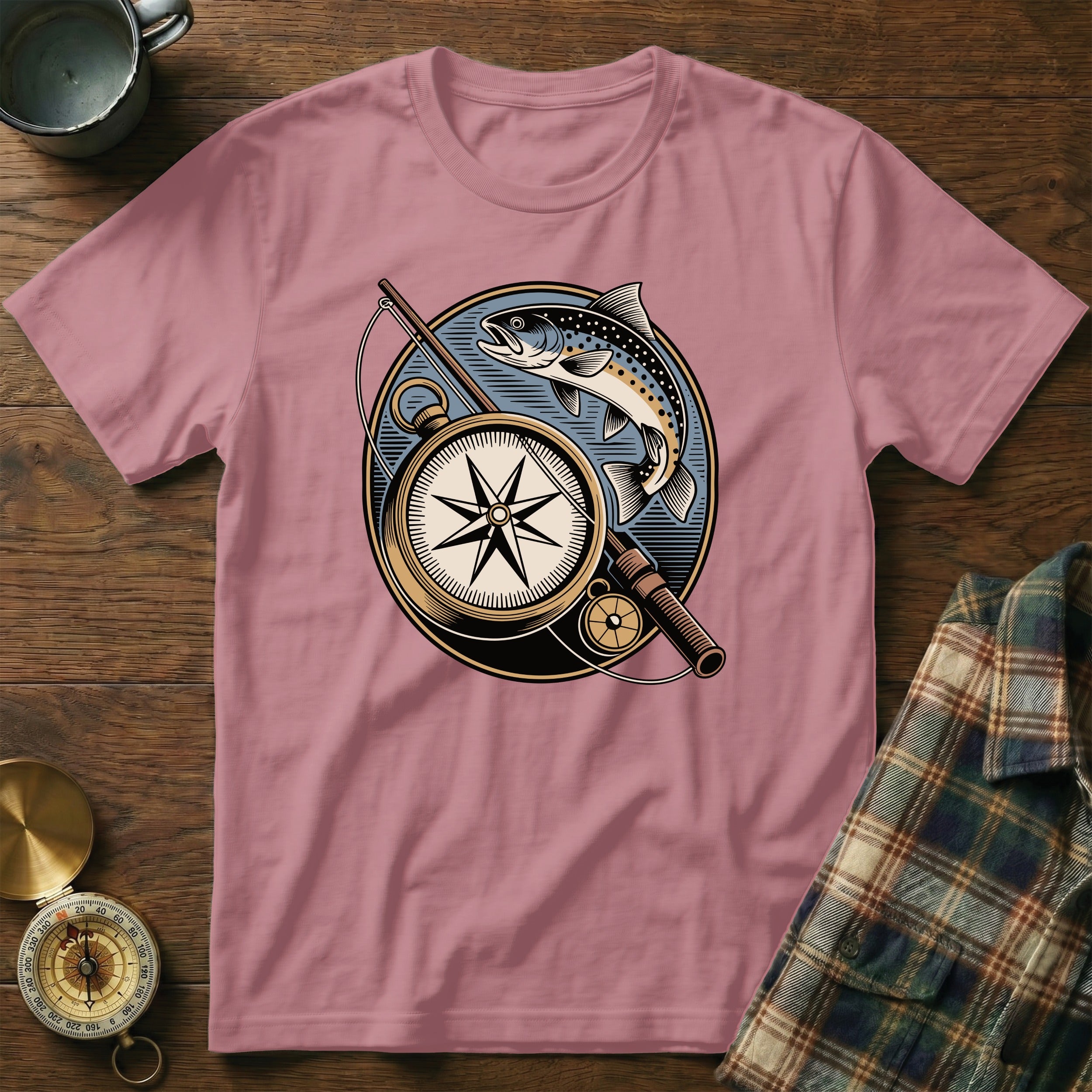 Salmon and compass illustration on a pink t-shirt.