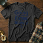 A black t-shirt printed with blue text reading Going with the flow. Slowly. and an anchor graphic.