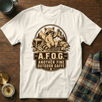 White t-shirt with raccoon graphic and text "A.F.O.G. Another Fine Outdoor Gaffe"