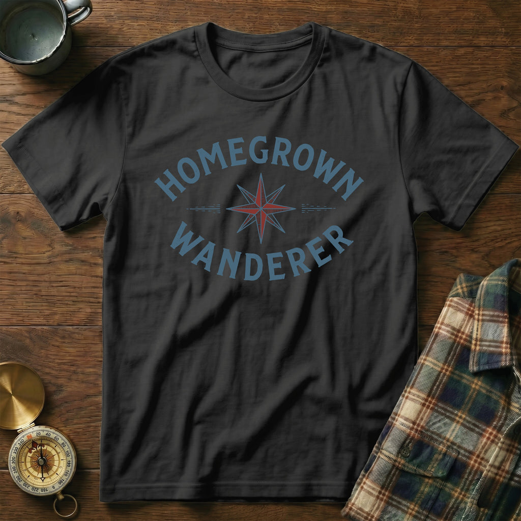 Black t-shirt with "HOMEGROWN WANDERER" text and compass graphic.