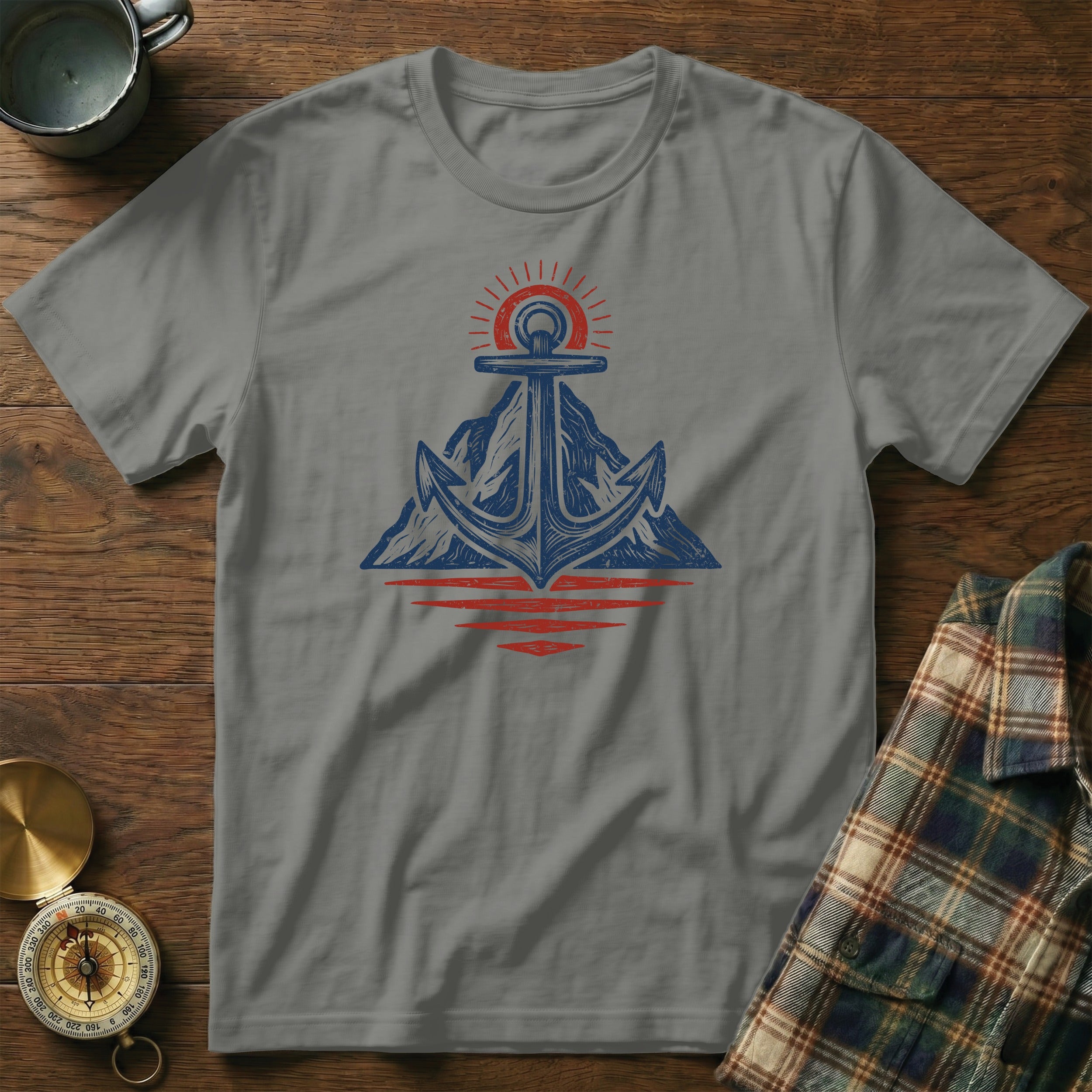 Grey t-shirt with an anchor, mountain, and sun graphic.