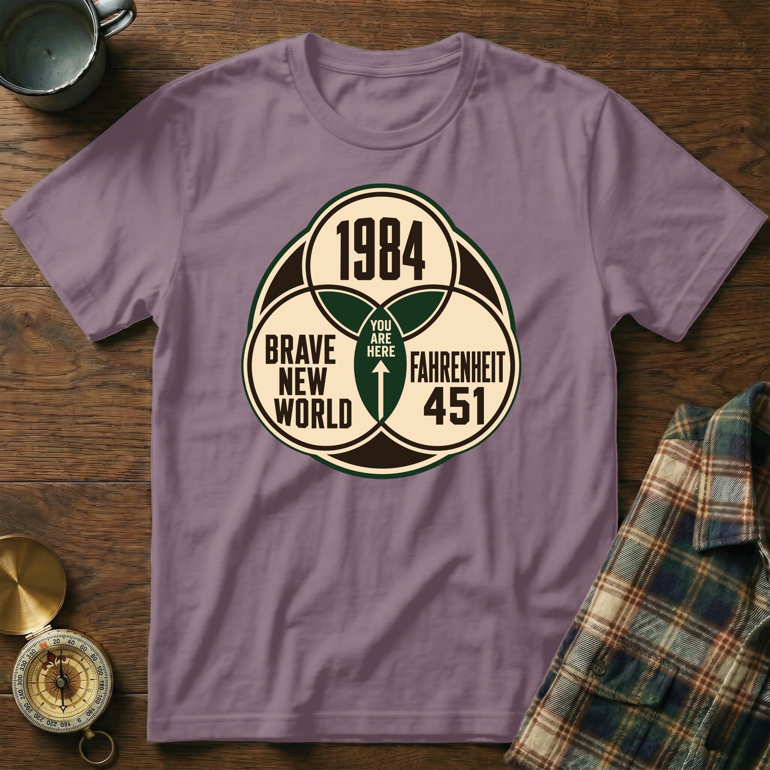T-shirt graphic with "1984", "Brave New World", and "Fahrenheit 451" texts.