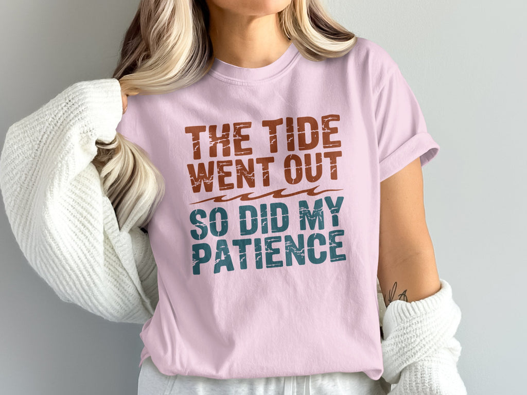 Pink t-shirt with text "The tide went out so did my patience".