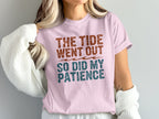 Pink t-shirt with text "The tide went out so did my patience".