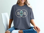 Dark blue t-shirt with Venn diagram graphic reading "The Plan," "Rarely," and "The Trail."