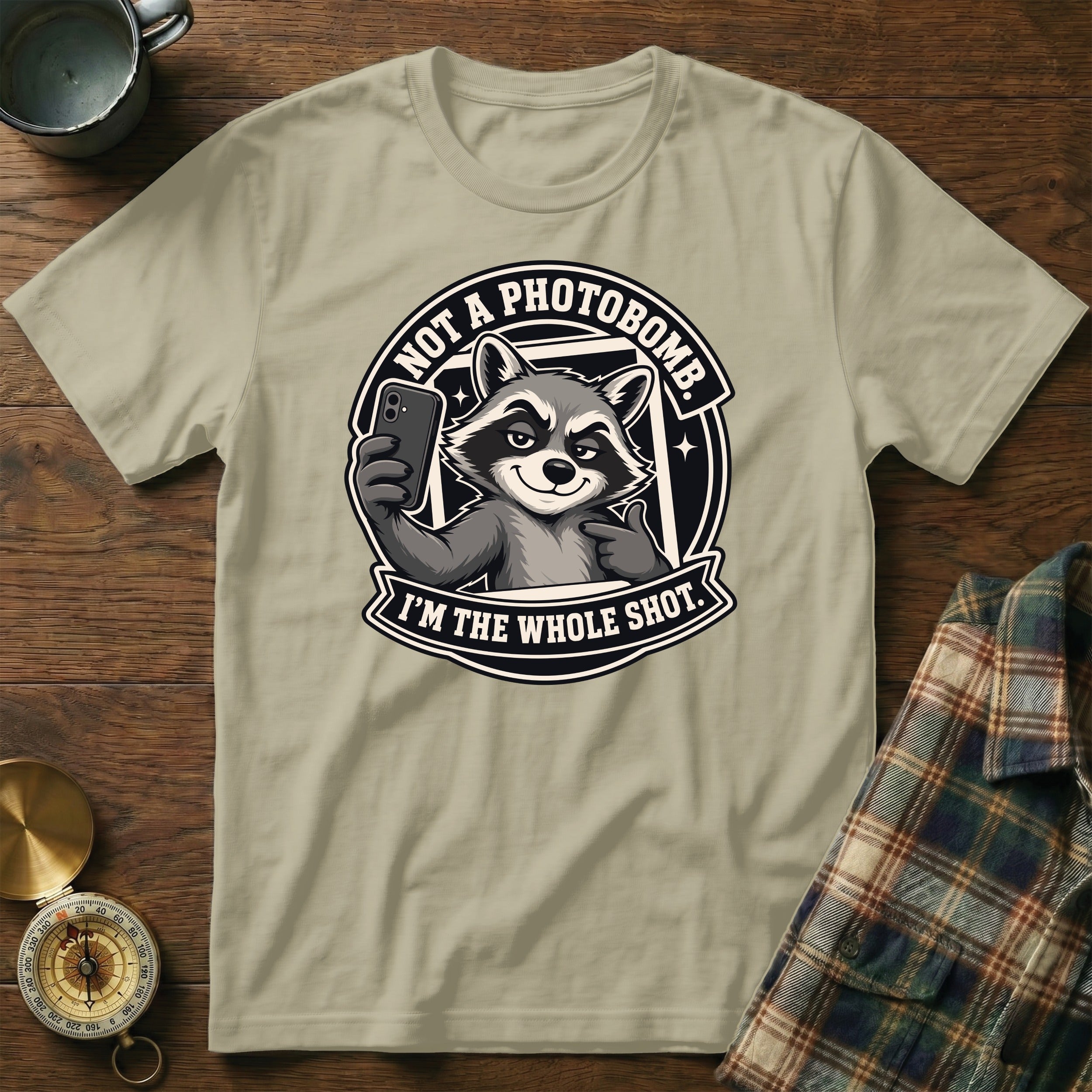 T-shirt featuring a raccoon taking a selfie with text "NOT A PHOTOBOMB. I'M THE WHOLE SHOT."