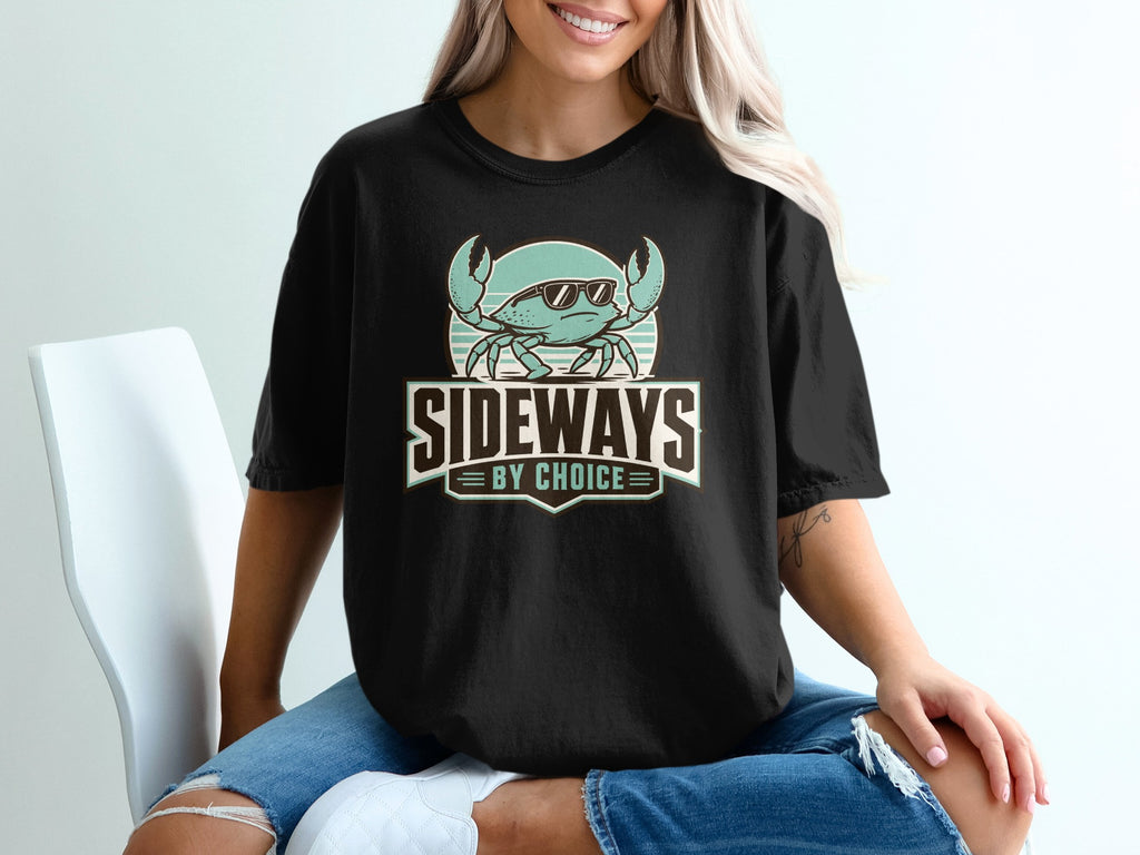 Black t-shirt with sideways crab in sunglasses and text "SIDEWAYS BY CHOICE".