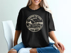 Black t-shirt with "Guarding The Chips Loosely" circular graphic.