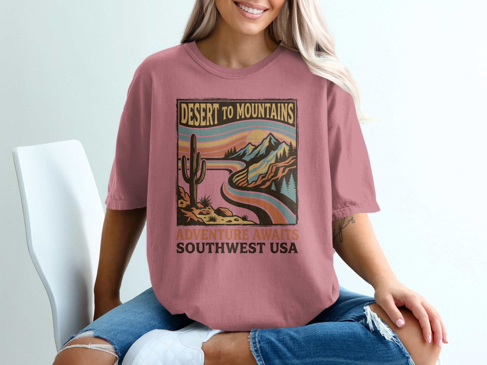 T-shirt featuring desert landscape and mountains with text "Desert to Mountains Southwest USA".