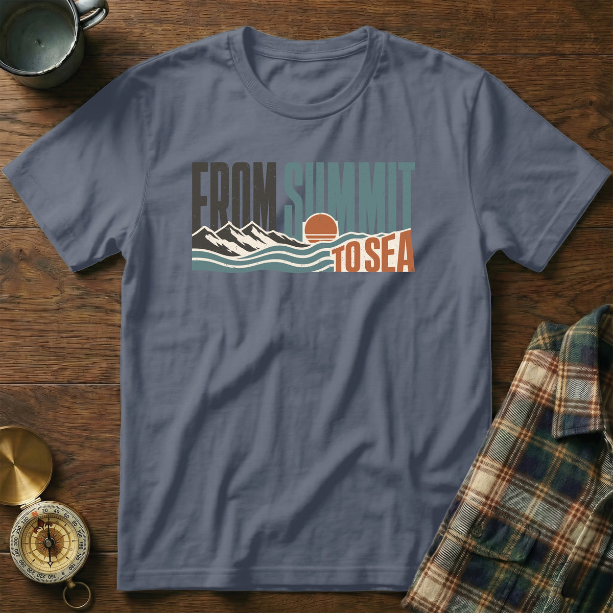 Blue t-shirt with "FROM SUMMIT TO SEA" text and mountain/wave graphic.