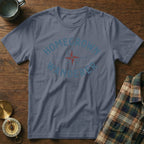 Blue t-shirt with "HOMEGROWN WANDERER" text, compass, and camping mug.