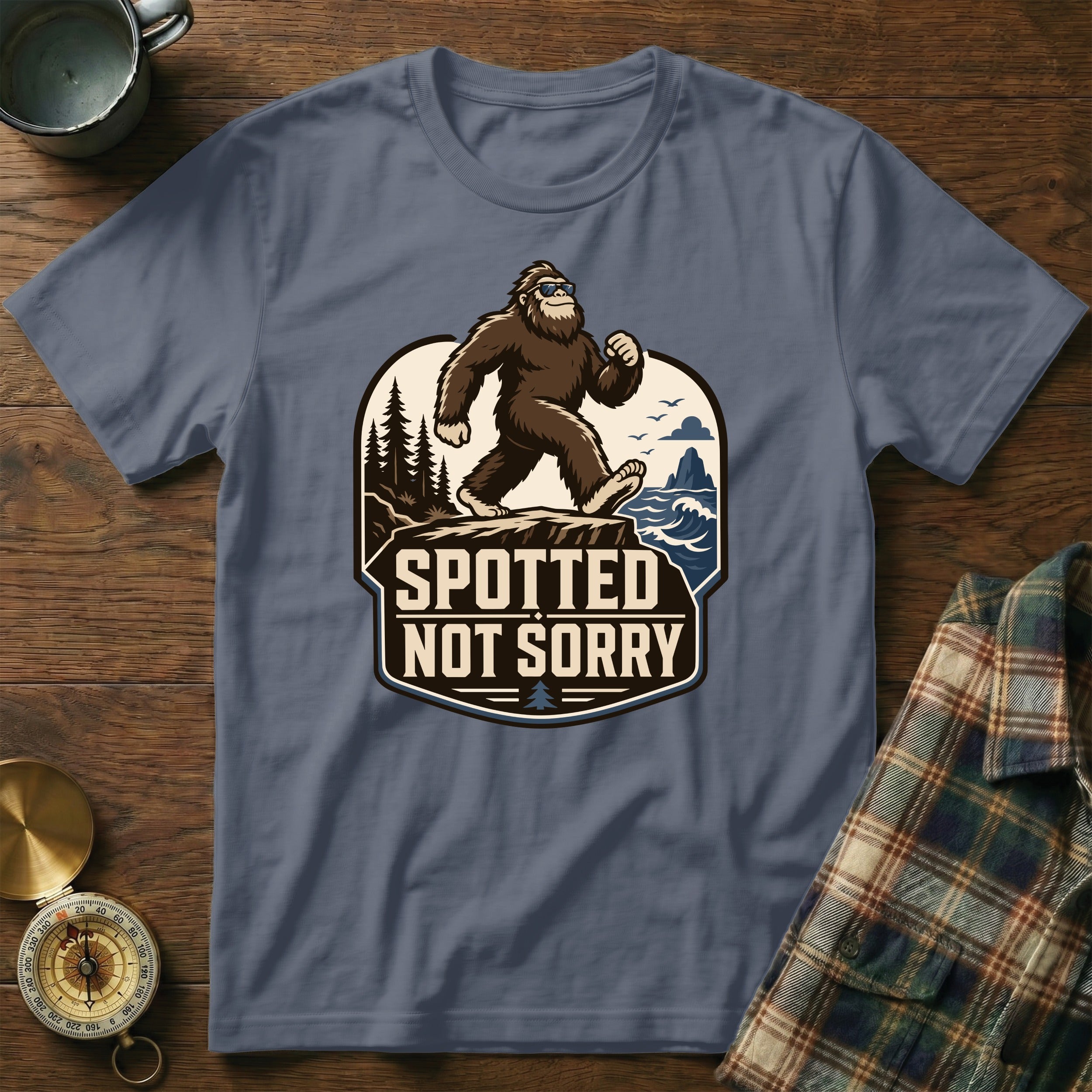 T-shirt with Bigfoot graphic and "Spotted Not Sorry" text.