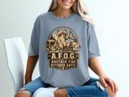 T-shirt graphic of raccoon with boot and camping gear, text: AFOG, Another Fine Outdoor Gaffe.