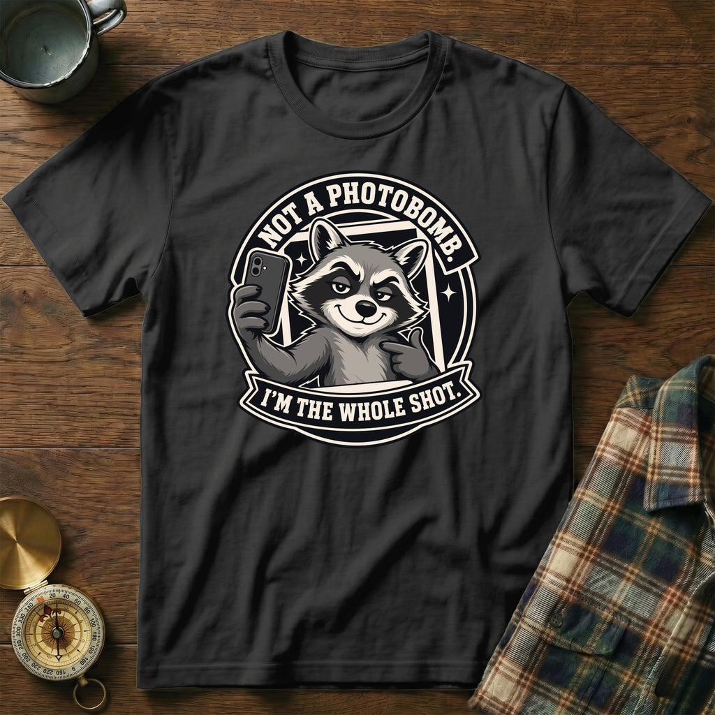 Black t-shirt with a raccoon graphic that says "Not a photobomb. I'm the whole shot."