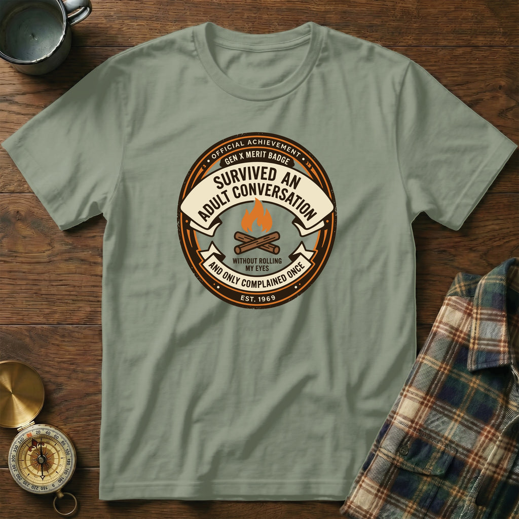 T-shirt design: "Survived an Adult Conversation" Gen X Merit Badge with flames.