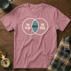 Pink t-shirt with Venn diagram graphic: "The Plan", "Rarely", "The Trail".