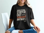 Black t-shirt with "Hooked Nothing Stayed Out Sunburnt Anyway" text and fishing hook.