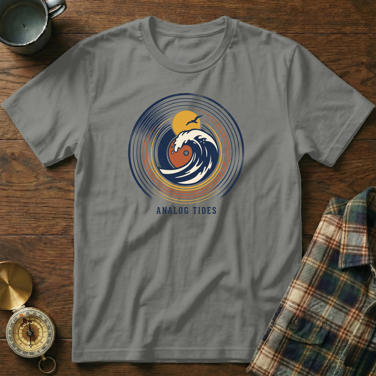 Gray t-shirt with "Analog Tides" text and a vinyl record graphic featuring a wave, sun, and bird.