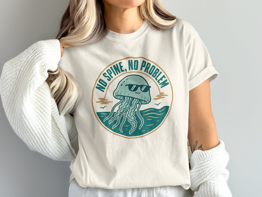 White t-shirt with graphic of a jellyfish wearing sunglasses and text "NO SPINE, NO PROBLEM".