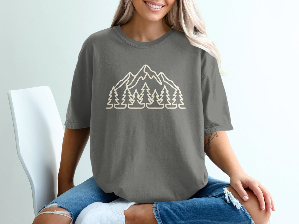 Gray t-shirt with a mountain and pine tree outline graphic on the front.
