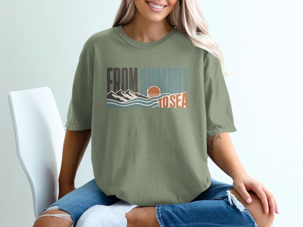 T-shirt with "FROM SUMMIT TO SEA" text, mountains, waves, and sunset graphic.