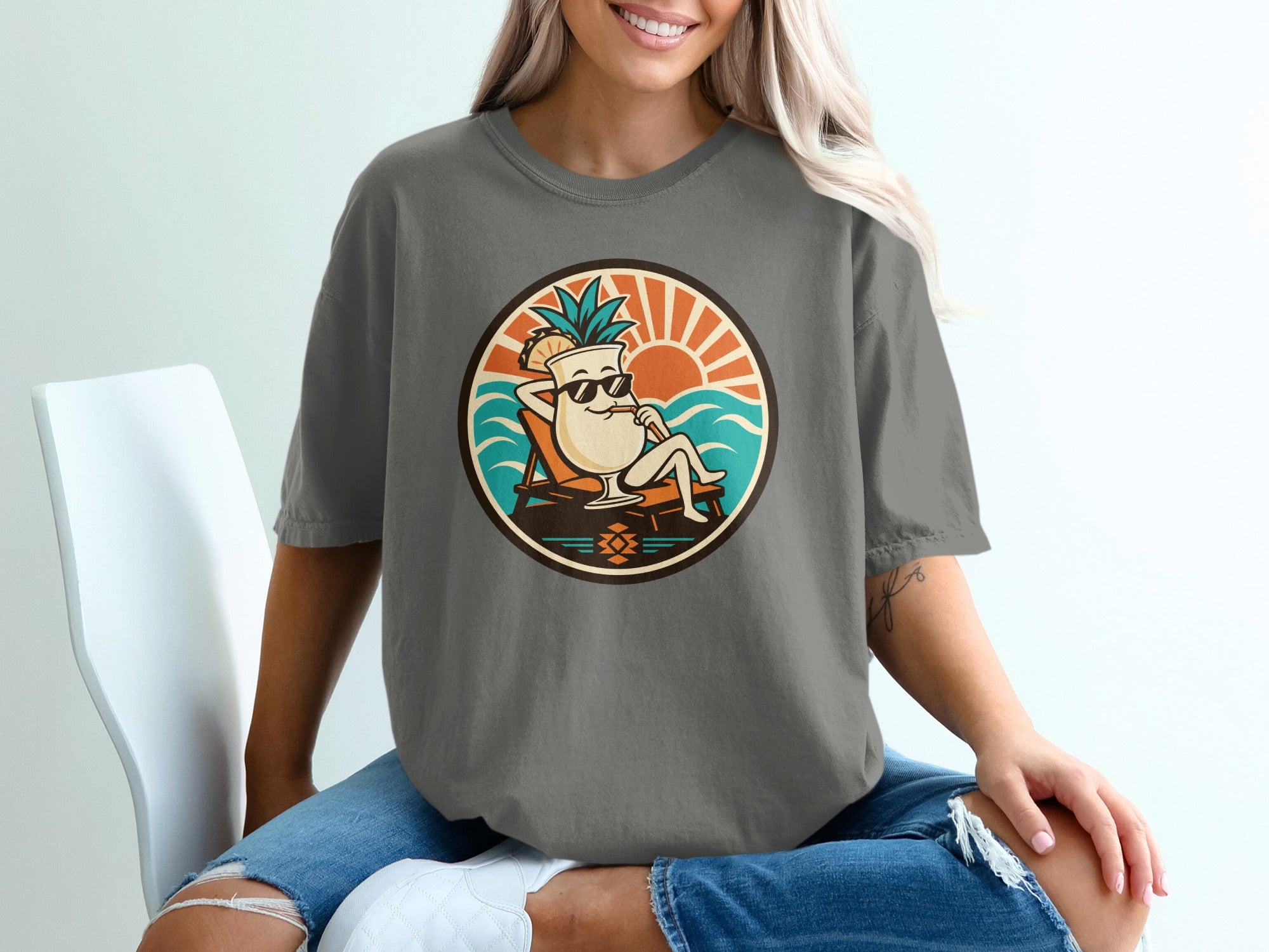 Cartoon glass with pineapple on beach chair, sunglasses, ocean, and sun.