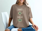 T-shirt with flowchart: Coast, Too Hot?, Yes, Mountain, Problem Solved.