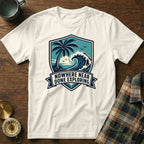 White t-shirt with blue beach graphic and "NOWHERE NEAR DONE EXPLORING" text.