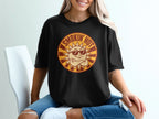 Black t-shirt with a cartoon sun wearing sunglasses and text "SMOKIN' HOT."
