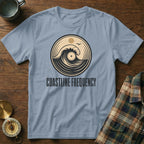Light blue t-shirt with "Coastline Frequency" and vinyl record wave graphic.
