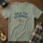 Light green t-shirt with "SEA TO SUMMIT" text and wave and mountain graphic.