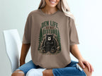 Graphic tee with bear in den and text "Den Life Do Not Disturb"