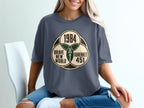 T-shirt graphic with 1984, Brave New World, and Fahrenheit 451, with "You Are Here".