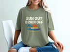 Olive green t-shirt with "Sun Out Brain Off Temporarily" text and a sunset graphic.