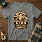Gray t-shirt featuring a raccoon holding a boot and text "A.F.O.G. Another Fine Outdoor Gaffe".