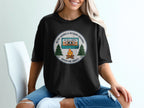 Black t-shirt with retro cassette tape and campfire graphic.
