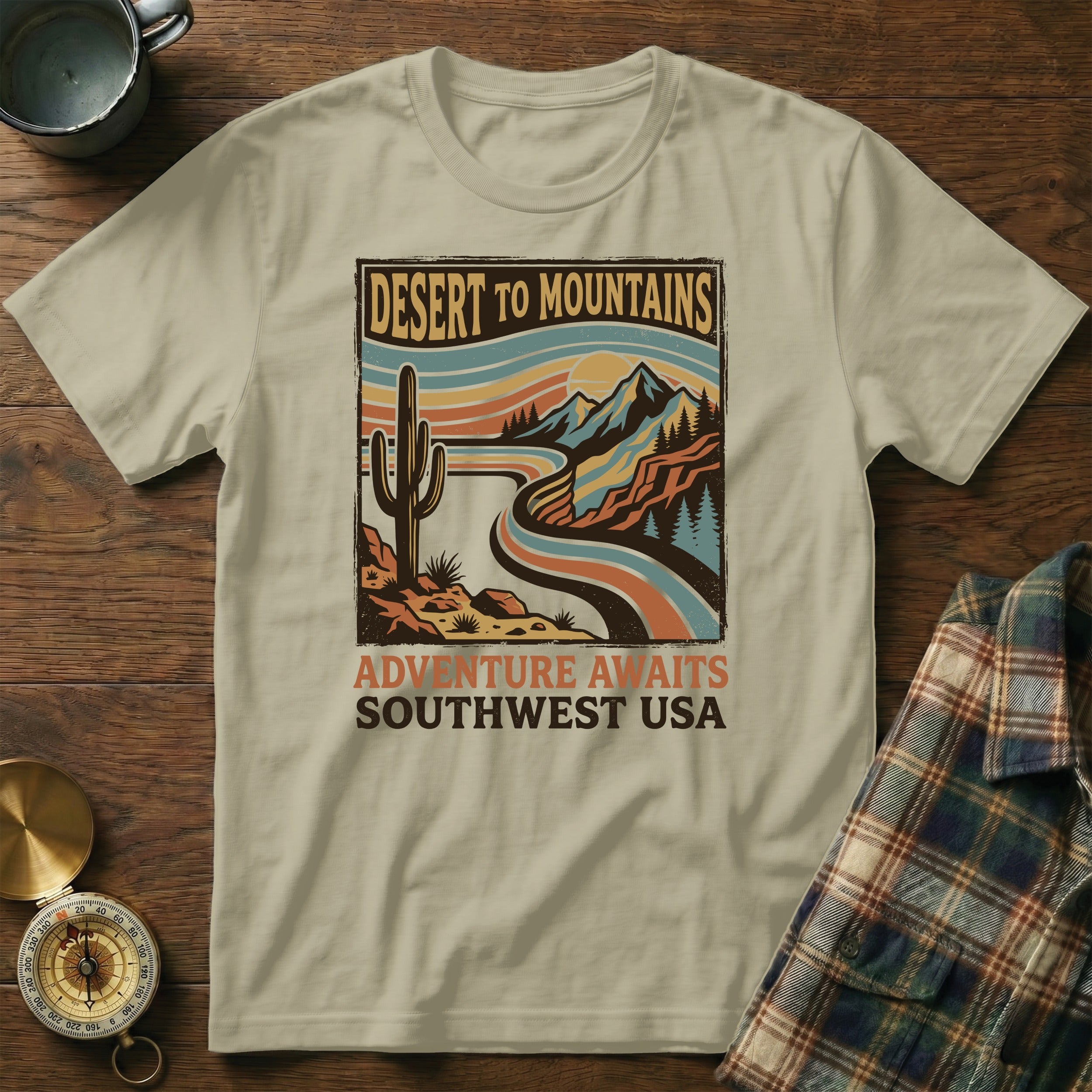 T-shirt with retro desert mountains landscape and text "Adventure Awaits Southwest USA".