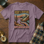 Purple t-shirt with "Desert to Mountains Adventure Awaits Southwest USA" graphic.